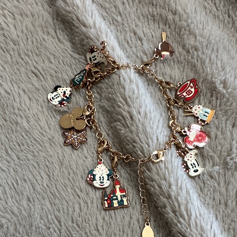 Disney “oops” charm bracelet.. Christmas